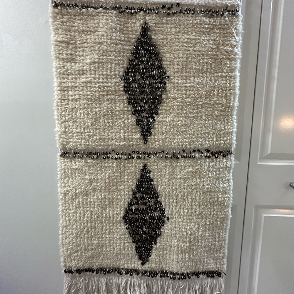 Cream and Black Geometric tapestry with coins